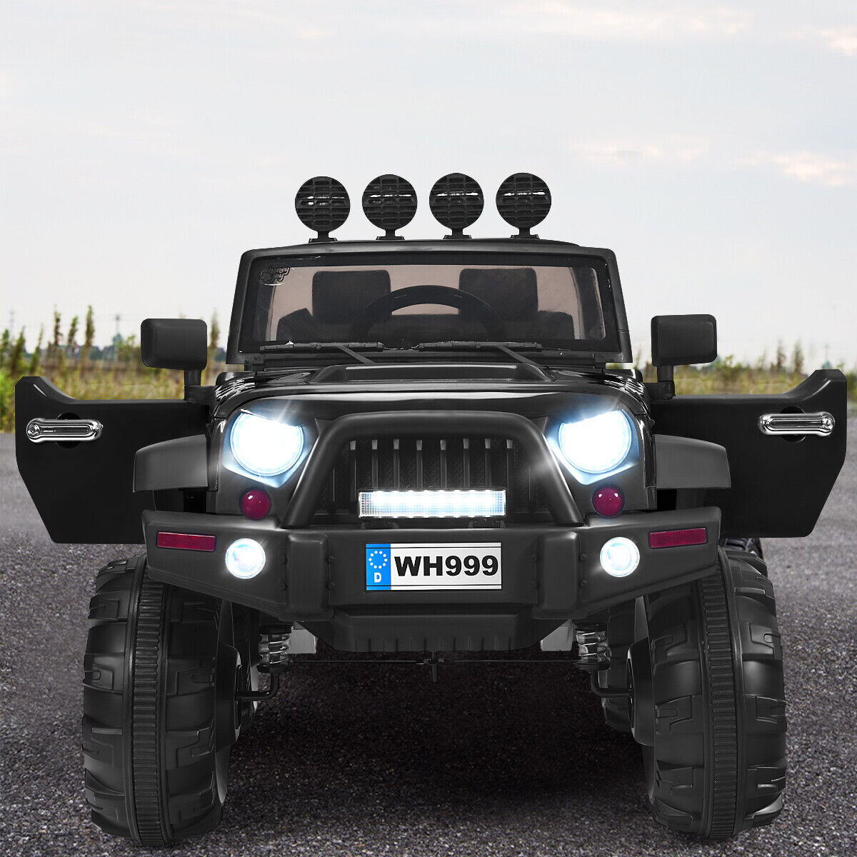 12V Kids Ride On Truck with RC Control, LED Lights, Music, and Spring Suspension in Black