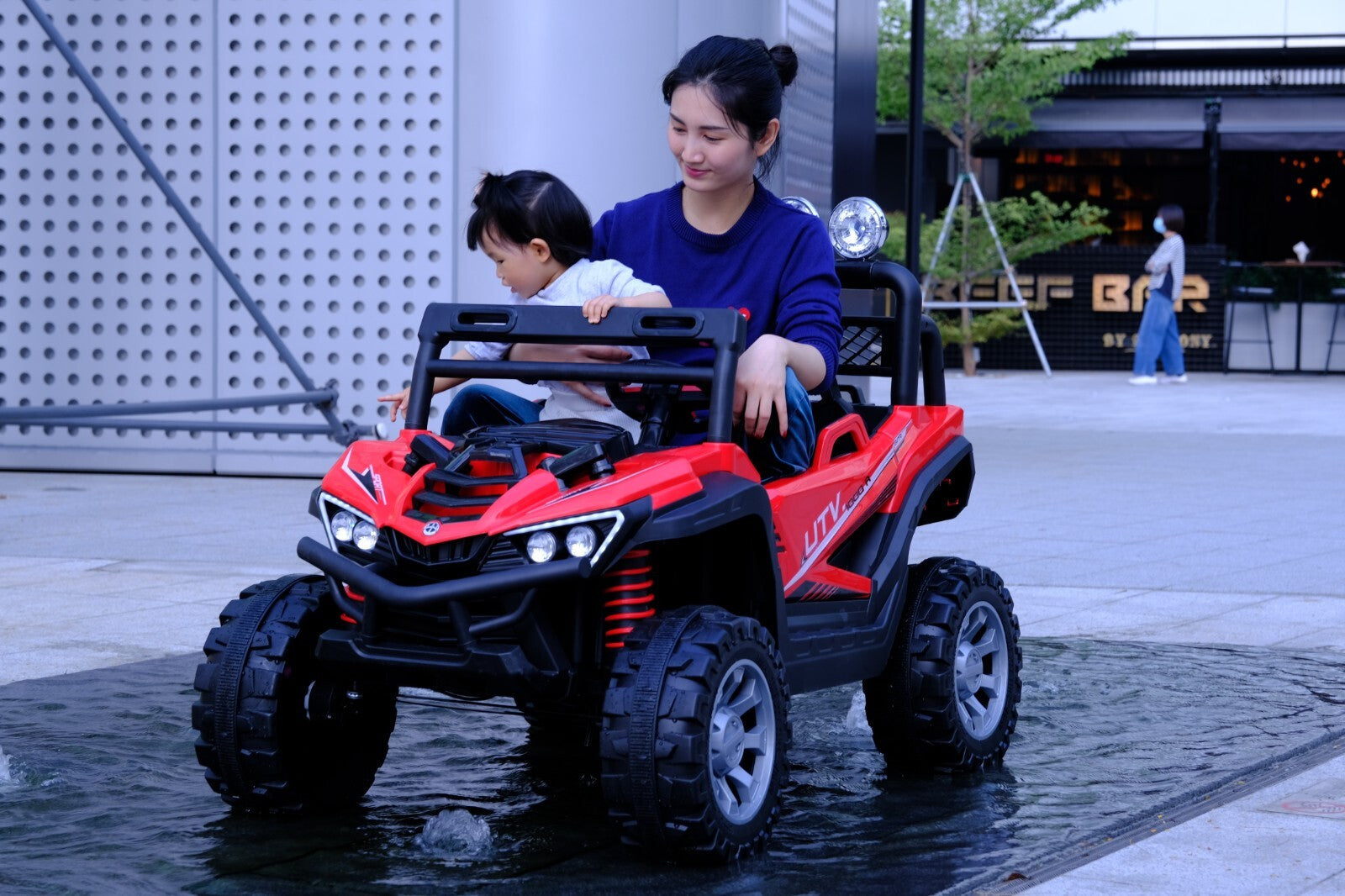 Kids 12V Ride-On Car with Remote Control, iPhone App Connectivity, and LED Lights